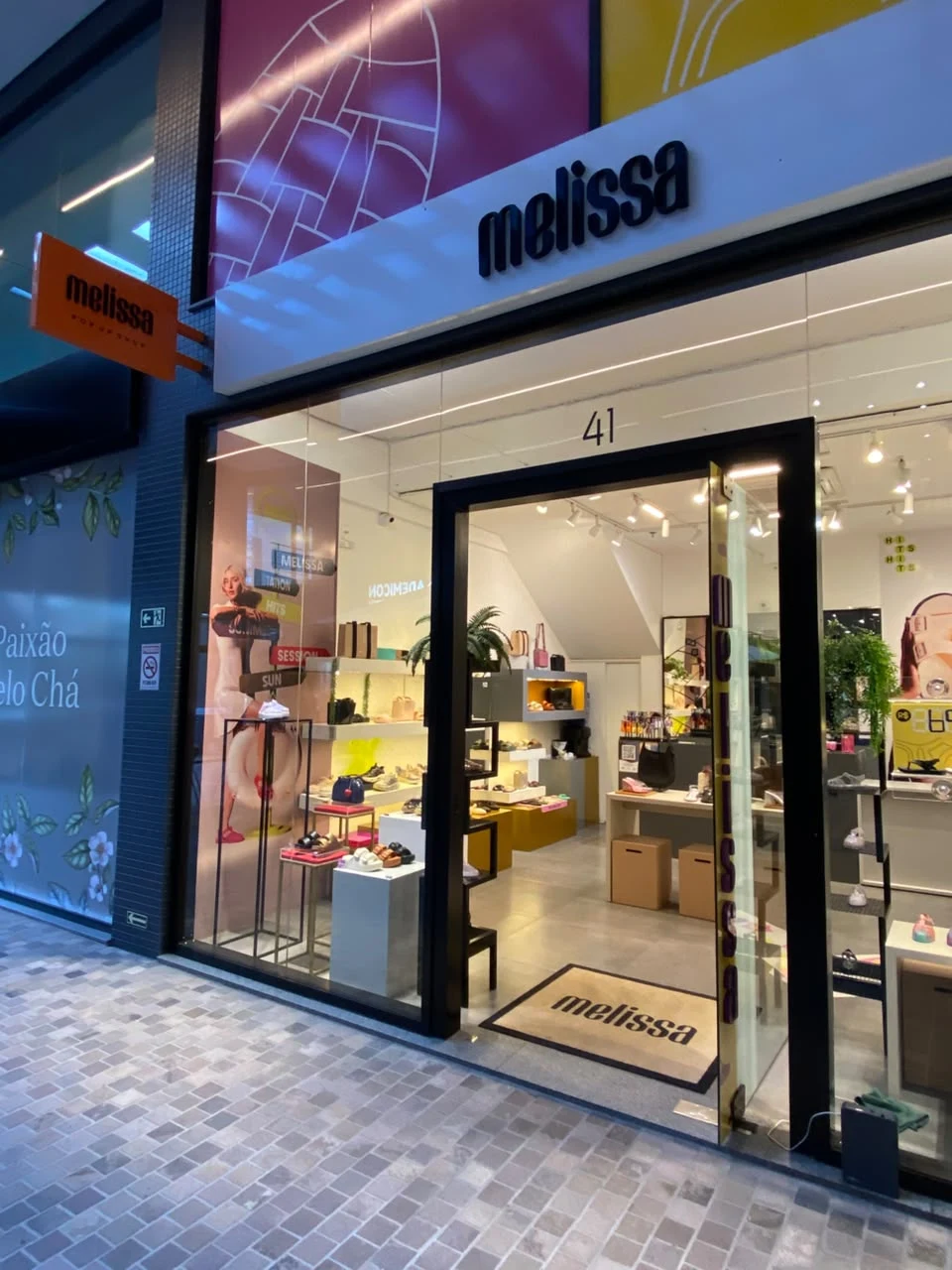 Melissa shop entrance with window displays and footwear stands